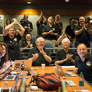Part of the New Horizons team celebrating the spacecraft's flyby of Pluto.