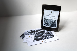 Business card, catalog, and coffee bag labels for The Omerta Club.